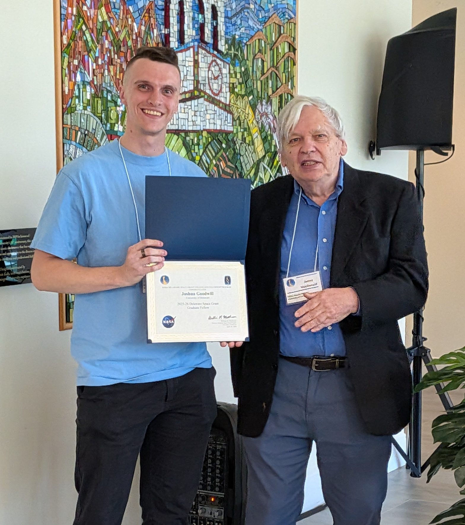 Space Grant Graduate Fellow Josh Goodwill with Deputy Director Dr. Jim MacDonald at the 2026 symposium
